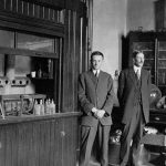 E.S. Freed and Charles O. Hill are pictured in a laboratory in Science Hall. The photo is in black and white and was taken between 1913 and 1915.